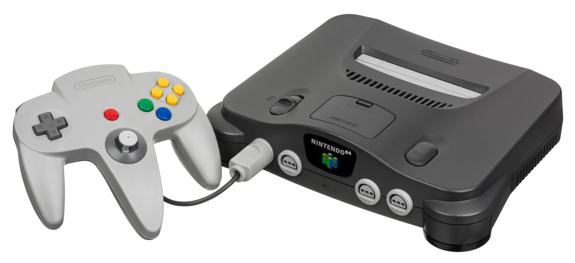 A dark grey Nintendo 64 console with a grey controller plugged into it